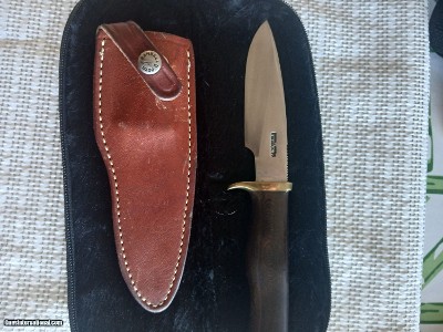 A Randall Gamemaster knife with a 4 1/2 in stainless blade of 1/4 inch stock
