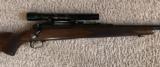 Excellent Pre-64 Winchester Model 70 Bolt Action Rifle - 30.06 with Vintage Weaver Scope and Hard Case - 1 of 11