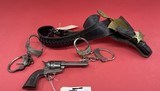 Cowboy Holster, Belt, 2 sets of Cuffs and Sheriff's Badge - 1 of 6