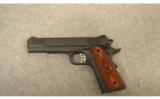 Springfield 1911-A1
.45 Auto - 2 of 9