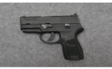 Sig Sauer P250 in
.40 Smith and Wesson - 2 of 3