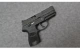 Sig Sauer P250 in
.40 Smith and Wesson - 1 of 3