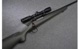 Remington 700 Bolt Action Rifle in .338 Win Mag with Swarovski Scope - 1 of 9