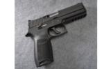 Sig Sauer P250 Semi Auto Pistol in .45 Auto with 9mm Conversion Kit - 1 of 3