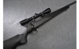 Weatherby Vangaurd Bolt Action Rifle in .223 Rem with Scope - 1 of 9