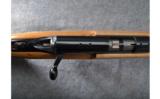Browning T-Bolt .22 Magnum Rifle with Flame Maple Stock - 5 of 9