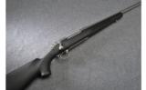 Remington Model 700 Stainless Bolt Action Rifle in .338 Win Mag - 1 of 9