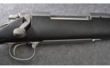 Remington Model 700 Stainless Bolt Action Rifle in .338 Win Mag - 2 of 9