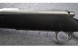 Remington Model 700 Stainless Bolt Action Rifle in .338 Win Mag - 7 of 9