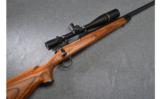 Remington Model 700 Heavy Barrel .22-250 with Leopold Scope - 1 of 9