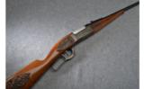 Savage Model 1899 Custom Engraved Lever Action Rifle in .303 Savage - 1 of 9