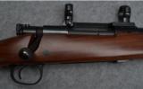 Winchester Model 70 Bolt Action Rifle in 7mm Rem Mag - 1 of 9