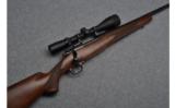 Winchester Model 70 Bolt Action Rifle in 7mm Rem Mag. - 1 of 8