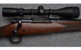Winchester Model 70 Bolt Action Rifle in 7mm Rem Mag. - 2 of 8