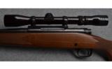 Winchester Model 70 Bolt Action Rifle in .30-06 Sprg. with RedField Scope - 7 of 9
