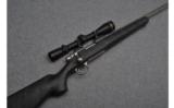 Remington 700 Stainless Bolt Action Rifle in .300 REM SA Ultra Mag with Leopold Scope - 1 of 9