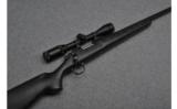 Remington 700 Varmint Fluted Bolt Action Rifle in .220 Swift - 1 of 9