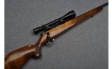 Weatherby Mark V Bolt Action Rifle in .257 Wby Mag
with Bausch & Lomb Scope - 1 of 9