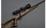Winchester Model 70 Coyote Bolt Action Rifle in .300 WSM with Nikon Scope - 1 of 8