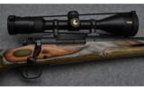 Winchester Model 70 Coyote Bolt Action Rifle in .300 WSM with Nikon Scope - 2 of 8