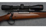 Remington Model 700 Bolt Action Rifle in .30-06 Sprg. with Redfield Scope - 2 of 9