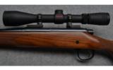 Remington Model 700 Bolt Action Rifle in .30-06 Sprg. with Redfield Scope - 7 of 9