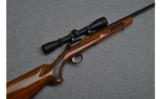 Browning T-Bolt Rifle in .22 Magnum with Leupold Scope - 1 of 8