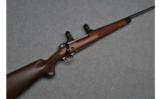 Winchester Model 70 Super Grade in 7mm Rem Mag - 1 of 9