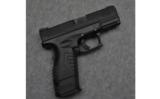 Springfield XDm-40 Compact 3.8 Pistol in .40 S&W - 1 of 4