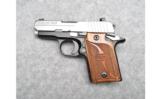 Sig Sauer P938
9mm Bi-Tone with Wood Grips - 2 of 2
