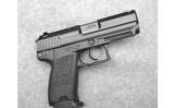 HK USP Compact .45 Auto with Case - 1 of 2