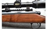 Remington 700 Deluxe Wood .300WM Nikon Monarch Scope - 5 of 9