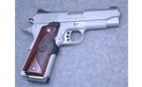 Kimber Stainless Pro Carry II, .45 ACP with Crimson Trace - 1 of 2