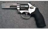 Smith & Wesson ~ 617-6 ~ .22 LR - 2 of 6