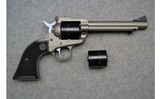 Ruger ~ Super Wrangler Single-Action Rimfire Revolver with Silver Cerakote Finish - 1 of 2