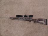 Mossberg 4X4 7MM Mag - 1 of 2