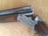 Drilling retailed by D. Schulnigg, Salzburg, Austria, double 12 Gauge shot barrels and .270 Winchester Rifle barrel. - 2 of 12