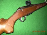 Tikka by Beretta Hunter (blue and walnut) in cal 260 Remington new in box with all - 5 of 7