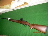 Tikka by Beretta Hunter (blue and walnut) in cal 260 Remington new in box with all - 1 of 7