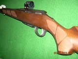 Tikka by Beretta Hunter (blue and walnut) in cal 260 Remington new in box with all - 2 of 7