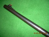 Remington 1100 slug barrel, 12ga 2 3/4" chamber, rifle sights, fiberoptic, fixed cylinder choke, 22 inches in length. - 4 of 4