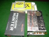 7mm Remington (2 boxes Herters all factory- norma mfg)(2 boxes premium ammo-Speer and Hdy) - 1 of 3