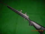 Remington 700 synthetic and stainless in 300 RSAUM - 6 of 12