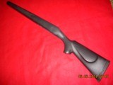 Remington 700 BDL Magnum short action factory synthetic stock with the sticky gel pad- used as is