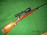Remington M 700 BDL in 7mm Remington Magnum w/scope - 1 of 9