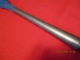 Remington 700 factory heavy stainless 22/250 barrel, appears new in wrap and 26