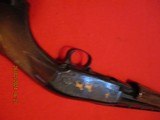 Winchester/ Browning M-12 in 28ga and a GRADE V - 8 of 10