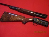 Winchester/ Browning M-12 in 28ga and a GRADE V - 9 of 10