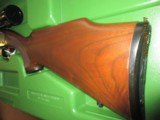 Remington 7400 in 243 Winchester- scoped and green factory case - 2 of 9