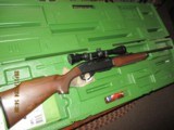 Remington 7400 in 243 Winchester- scoped and green factory case - 4 of 9